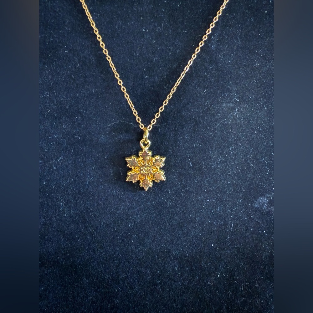 Chanel Gold Leaf Pendant Pull Necklace. Marking on back. NWOT